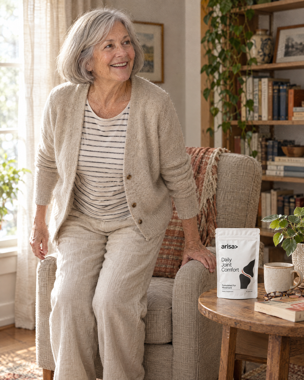 Smiling woman getting up from her armchair, Arisa pouch on the side table